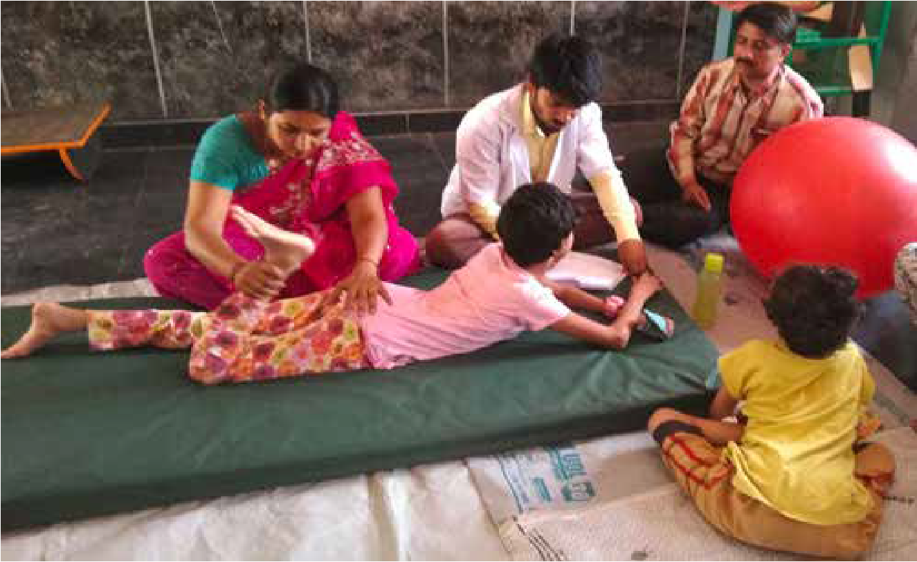 A child ungergoing physiotherapy